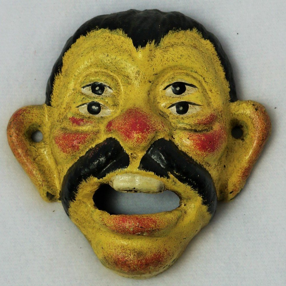 4 Eyed Bottle Opener Cast Iron Vintage Wall Mount Face