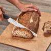 Kyocera Advanced Ceramic Revolution Series 7-inch Serrated Slicing Bread Knife, Black Handle, White Blade view 3