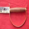 Uster champagne saber wood handle view 3
