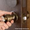Master Lock TUO0105T Tulip Door Knob with Lock, Antique Brass, Pack of 2 view 2