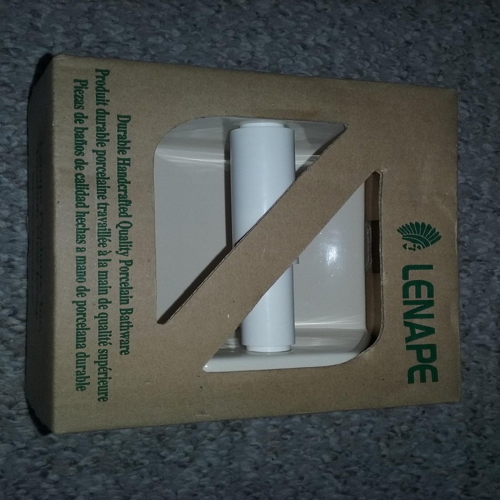 Professional 4-1/4 In. x 6-1/4 In. Bone Ceramic Toilet Paper Holder