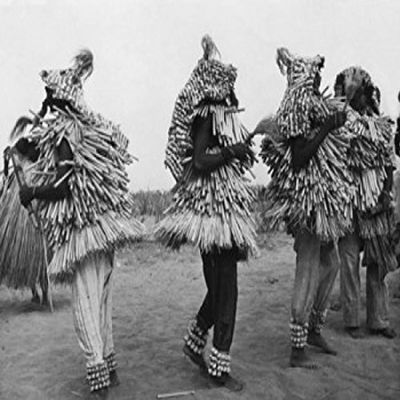 Native dancers wearing costumes and dancing Benin Poster Print (18 x 24)