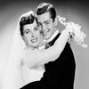 Portrait of newlywed couple embracing Poster Print (18 x 24) view 1