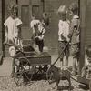 Buyenlarge 'Children Load Stones in Wagon with Shovel' Paper Poster, 20 by 30-Inch view 1