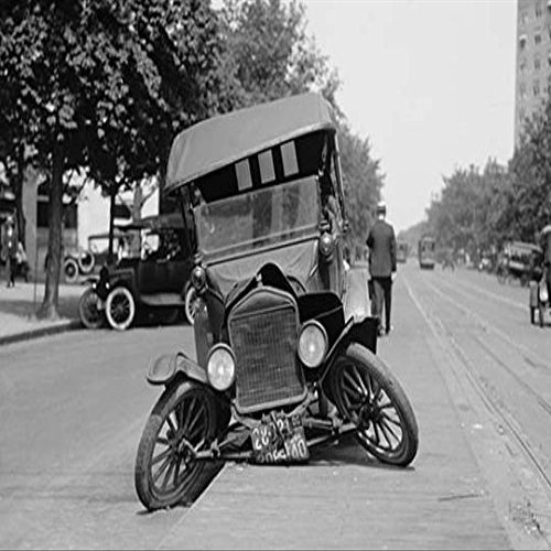 BEL Automobile's Front Axel Breaks splaying Tires Outward Causing Vehicle to Rest on its Front Bumper. (12x18 Canvas Print)