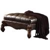 Acme Versailles Faux Leather Upholstered Ottoman in Dark Brown and Cherry Oak view 1