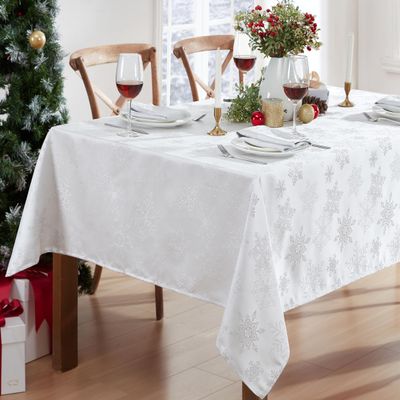 Newbridge Fancy Metallic Snowflake Christmas Fabric Tablecloth, 60 x 102 Inch Rectangle, White Silver, No-Iron Soil Resistant Sparkling Snowflakes Woven Holiday Table Cover