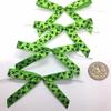 50 Pcs Satin Pre-tied Ribbon Bows with Removable clear twist ties for bag decoration in Halloween (Green Cat Bows) view 1