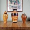 Large Display Vase With A Beautiful Star Design Made From Many Pieces of Hardwood From All Over The World. view 3