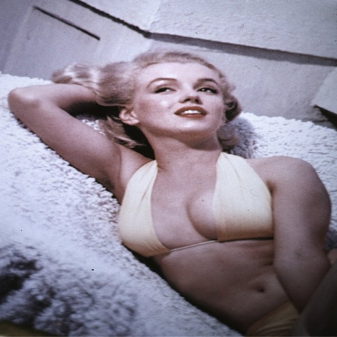 Marilyn Monroe lying down wearing a bikini Photo Print (24 x 30)