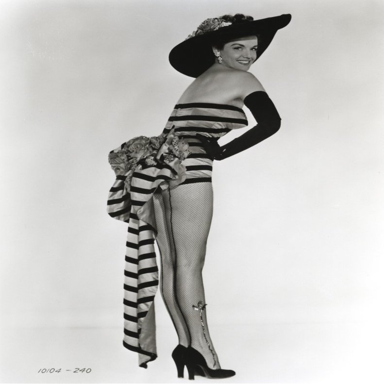 Jane Russell in a striped one piece and wide brimmed hat Photo Print (24 x 30)