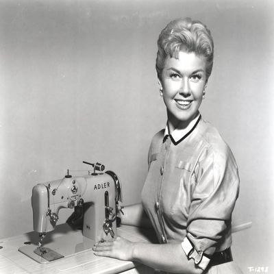 Doris Day Posed in Classic with Sewing Machine Photo Print (30 x 24)