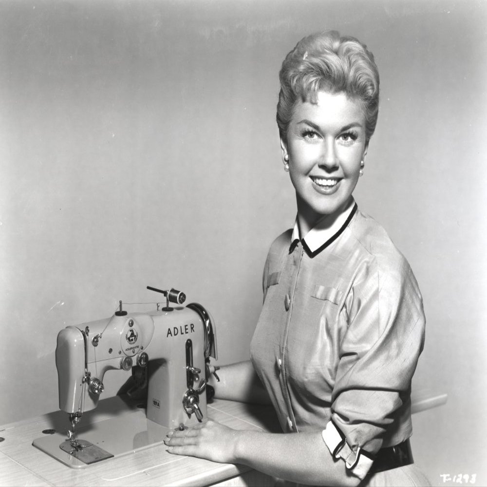 Doris Day Posed in Classic with Sewing Machine Photo Print (30 x 24)