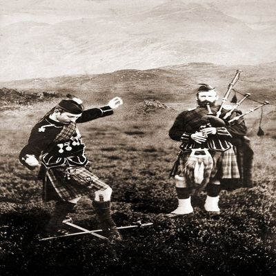 Two Men in Kilts Dance Over Swords with Bagpipe Playing Poster Print by Unknown (18 x 24)
