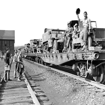 1940s World War Ii Freight Train Of Jeeps And Half Tracks On Way To The Front Factory Workers Bid Farewell To Soldiers