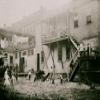 Cottage Street hovels down by the river in Easthampton Mass in which a great deal of home work is done on suspenders Poster Print (18 x 24) view 1