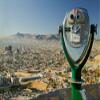 Long range binoculars for tourists and panoramic view of skyline and downtown of El Paso Texas looking toward Juarez Mexico Poster Print by Panoramic Images (36 x 24) view 1