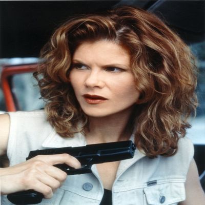 Lolita Davidovich Looking Away with Pistol Close Up Portrait Photo Print (24 x 30)