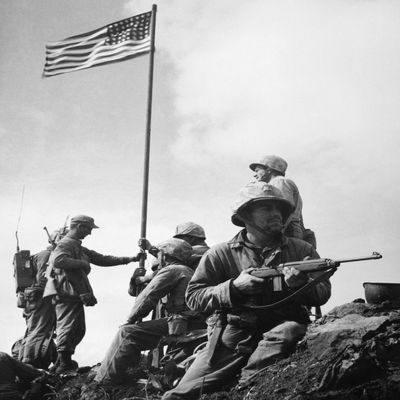 World War Ii Iwo Jima Nthe Raising Of The First Flag On Mount Suribachi Iwo Jima 23 February 1945 The Soldiers Are Sergeant Henry Hansen (Without Helmet) Sergeant Ernest Thomas (Seated By Flagpole) Co