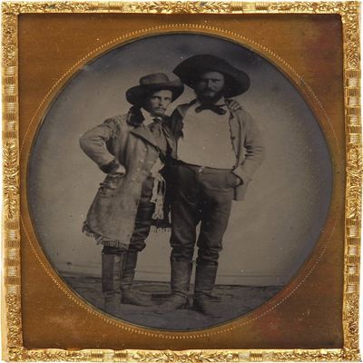 Two Western Gentlemen A Particularly Clear Image Of Two Pals Posed Standing One With His Around The Others Shoulder The Image Clearly Shows The Fringed Buckskin Jacket And Stovepipe Boots Of One Of Th