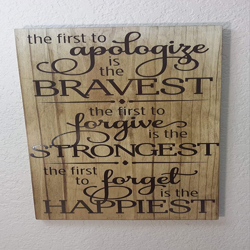 11x20 The First to Apologize is The Bravest The First to Forgive is The Strongest The Fist to Forget is The Happiest in Vinyl Lettering On Stained Wood Inspirational Sayings and Quotes