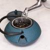 Frieling Arare Cast Iron Teapot with Stainless Steel Infuser - Teal, 40 Oz Cast Iron Tea Kettle with Infuser - Stovetop Kettle - Teapot Stovetop view 4