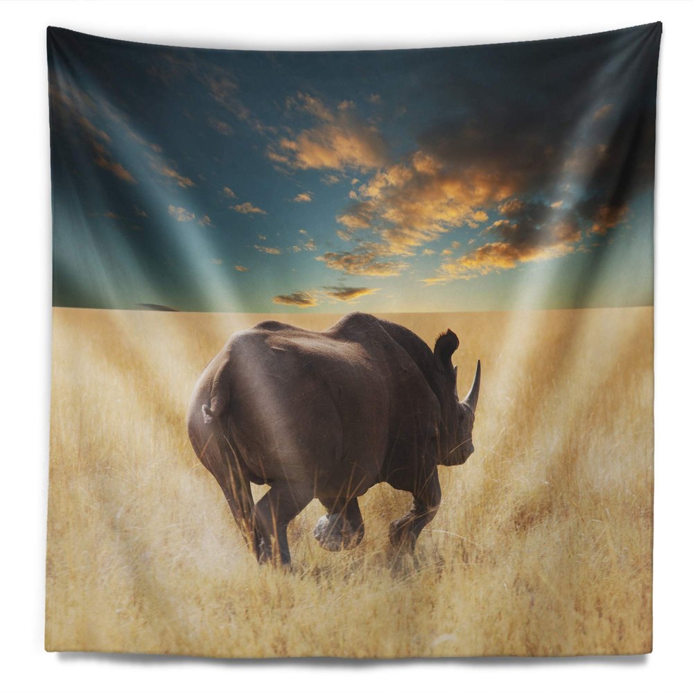 Designart ' Giant Rhino Under Cloudy Sky' African Tapestry Blanket Dcor Wall Art for Home and Office, Created On Lightweight Polyester Fabric Medium: 32 in. x 39 in