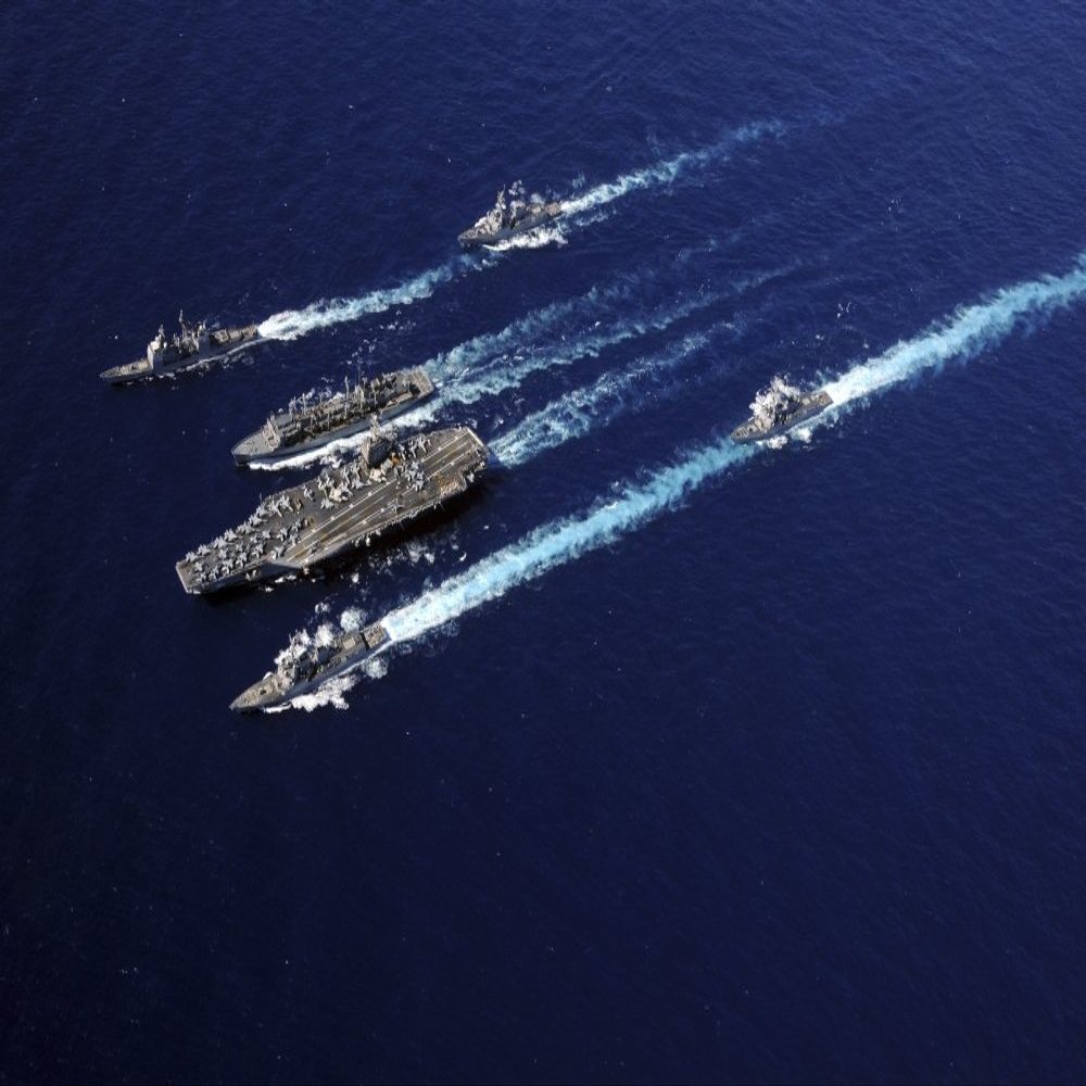 Posterazzi The Abraham Lincoln Carrier Strike Group ships cruise in formation in the Pacific Ocean Poster Print, (34 x 22)