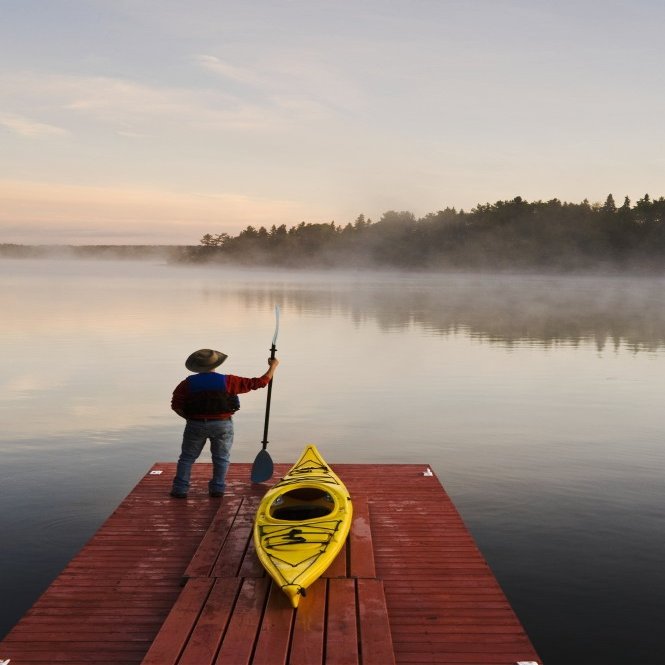 Posterazzi Man Standing Poster Print by Kayak On Dock In Northwestern Lake Of The Woods Ontario Canada, (12 x 18)