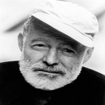 Posterazzi Ernest Hemingway wearing a baseball cap Photo Poster Print, (24 x 30)