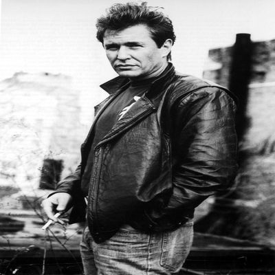 Posterazzi Film still of Tom Berenger wearing a leather jacket outdoors Photo Poster Print, (8 x 10)