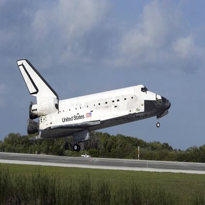 Space shuttle Discovery lands Runway 33 at the Shuttle Landing Facility at Kennedy Space Center in Florida Print (34x22)