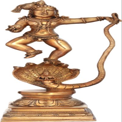 Exotic India Lord Krishna Vanquishes Kaliya - Brass Statue - Color Natural Brass Color