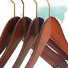 Concave Wooden Top Hanger with Walnut Finish, Thick Curved Coat Hangers with Brass Swivel Hook for Jackets or Fine Shirts (Set of 50) by The Great American Hanger Company view 4