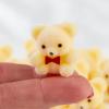 Factory Direct Craft Package of 24 Sitting Flocked Yellow Miniature Teddy Bears - Tiny Bear Shaped Figurines (Size: 1 inch) view 3