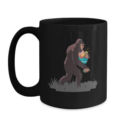 BeeTeeStore Bigfoot Easter Coffee Mug - Sasquatch Hunting Eggs Illustration - 15 oz Black Ceramic Tea Cup for Animal Lovers, Egg Hunt Gifts & Birthday Surprises