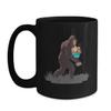 BeeTeeStore Bigfoot Easter Coffee Mug - Sasquatch Hunting Eggs Illustration - 15 oz Black Ceramic Tea Cup for Animal Lovers, Egg Hunt Gifts & Birthday Surprises view 1