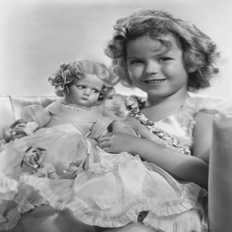 Posterazzi Poster Print Collection Shirley Temple with an Italian Made Doll Given to Her by A Fan in New York City Portrait (8 x 10)