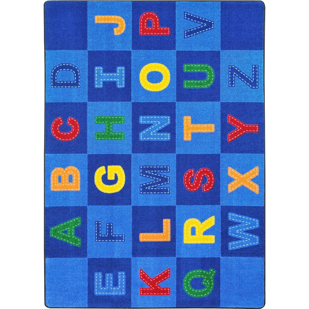 Joy Carpets Kid Essentials Patchwork Letters 5'4" x 7'8" Area Rug in Color Multi