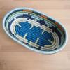 African Bread Basket- Mwangaza/Sisal and Sweetgrass/Woven Basket/Made in Rwanda/Blues, Orange, Green, Yellow, White view 2