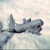 Home Comforts Lockheed P-3C Orion A high Angle Right-Side View of a P-3C Orion in-Flight Over a Thick Cloud Bank. Vivid Imagery Laminated Poster Print-20 Inch by 30 Inch Laminated Poster view 1