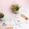 TFu Wall Hanging Photo Display, DIY Picture Photo Frame String with 12 Clips for Hanging Photos Notes and Artworks (Round Shape Clip) view 3