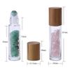 Lasenersm 10 Pieces 10ml Clear Glass Roll-on Bottles with Gemstone Roller Ball and Healing Crystal Chips Inside, Bamboo Lids - Personal Care, Aromatherapy, DIY Beauty or Wellness view 3
