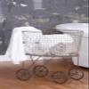Creative Co-Op Vintage Reproduction Metal Laundry Basket on Wheels, Rust view 3
