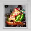 17" Pre-Lit Green and Red Holographic Santa in Sleigh Christmas Window Silhouette Decoration view 3