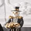 13 Inch Black and Gold Skeleton Holding Gold Jack O Lantern view 2