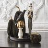 13 Inch Black and Gold Skeleton Holding Gold Jack O Lantern view 4