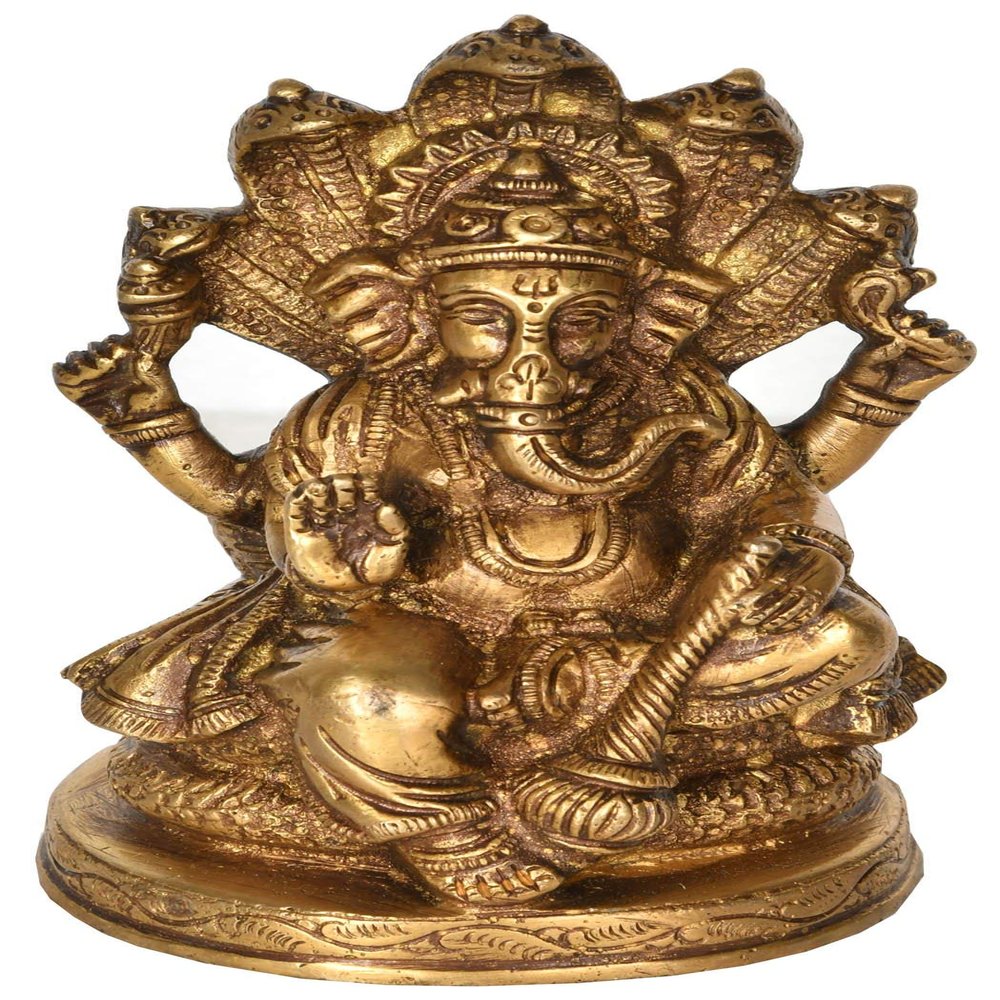 Exotic India Lord Ganesha Seated on Sheshanaga - Brass Statue - Color Natural Brass Color