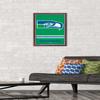 NFL Seattle Seahawks - Retro Logo 15 Wall Poster, 22.4L" x 14.7W", Mahogany Framed Version view 2