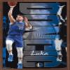 Trends International NBA Dallas Mavericks - Luka Doncic 19 Wall Poster, 14.725" x 22.375", Mahogany Framed Version view 1